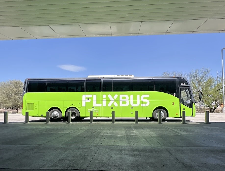 A green FlixBus at 44th Street & Washington in Phoenix Arizona