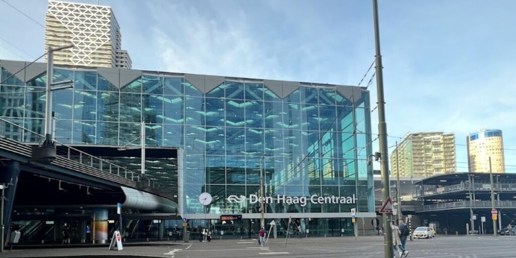 Modern glass facade of Den Haag Centraal station