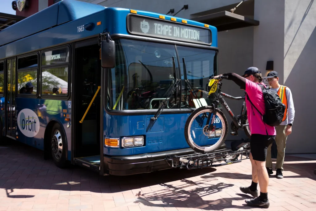 Jack Ketcham at Culdesac helping to teach someone how to use orbit bike rack